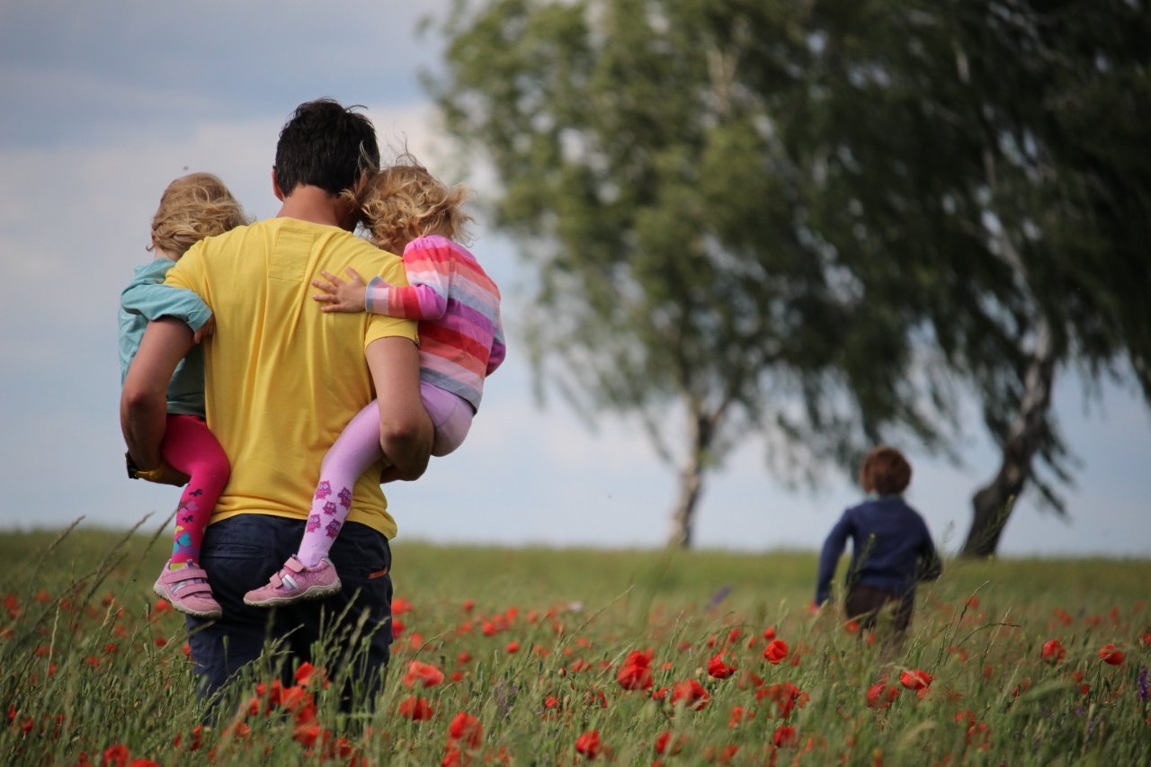 Dad Playing with Children